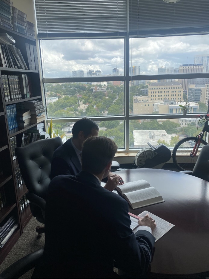 GHC Lawyers sitting in a meeting room.